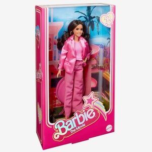 Gloria Doll Wearing Pink Power Pantsuit – Barbie The Movie